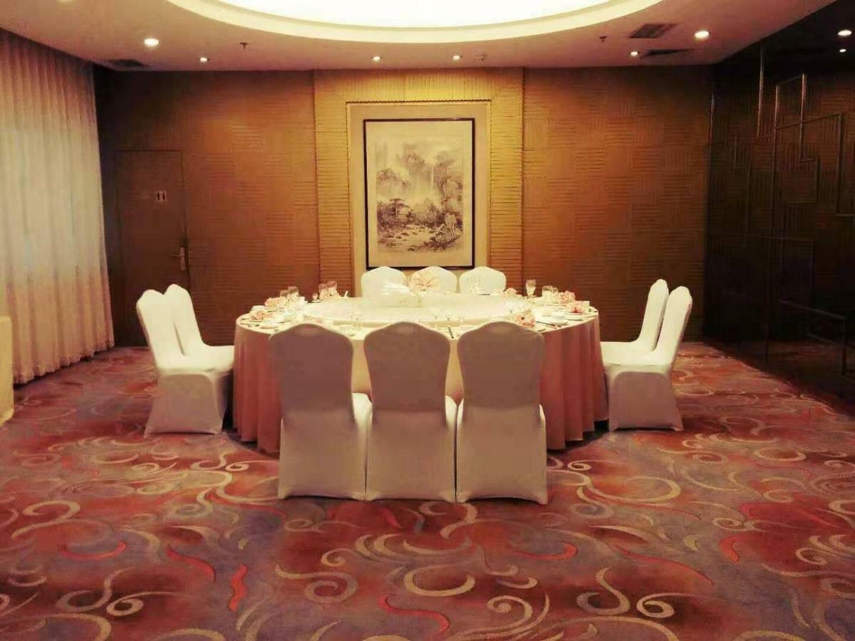 Kerren Hotel Dalian Exterior foto